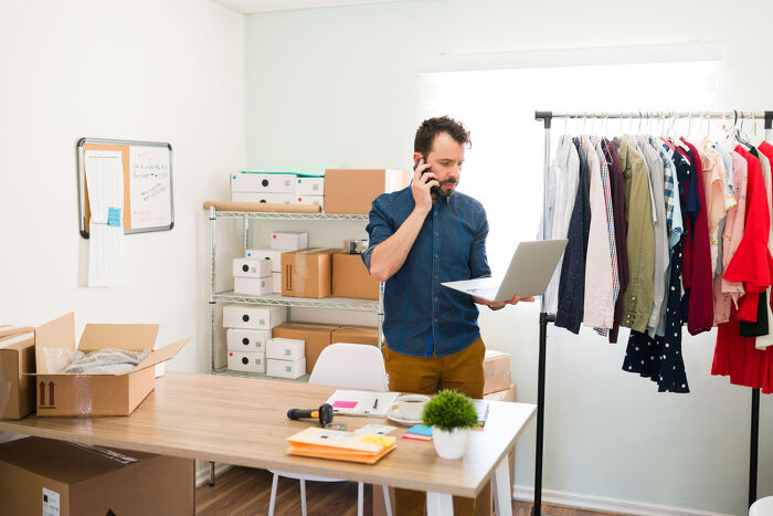 image of a business owner who has his staff using Did They Pay to view and send emails to customers.